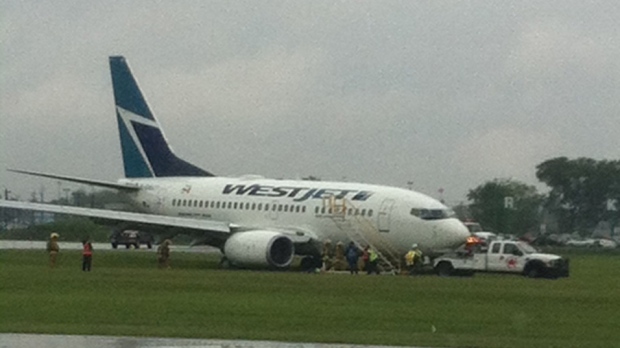 This WestJet Boeing 737 is seen getting towed off