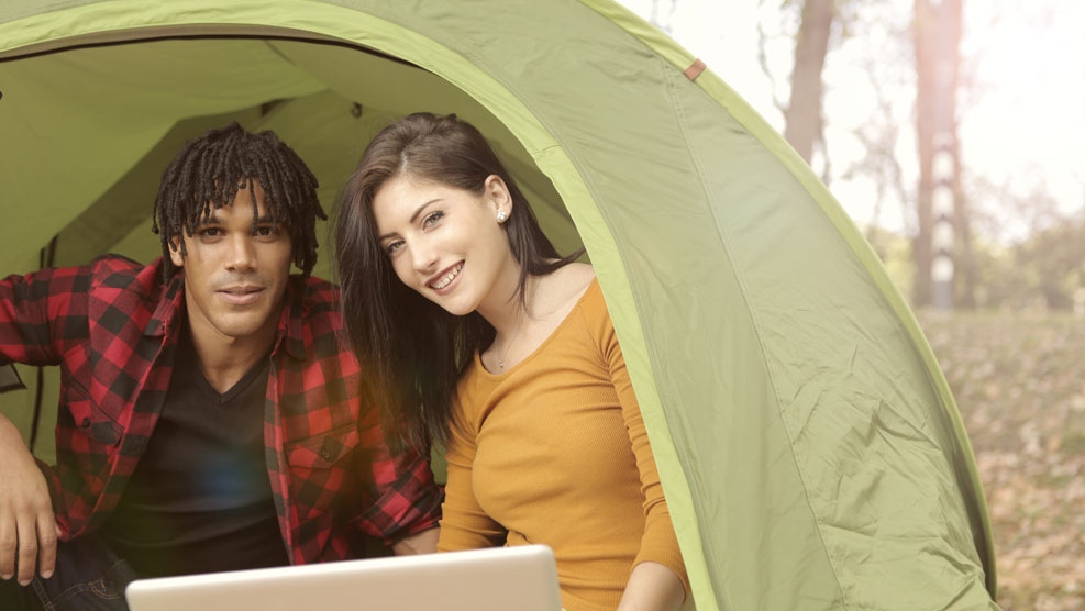 A couple is seen camping in a tent in this undated file photo. (Photo by Andrea Piacquadio from Pexels)