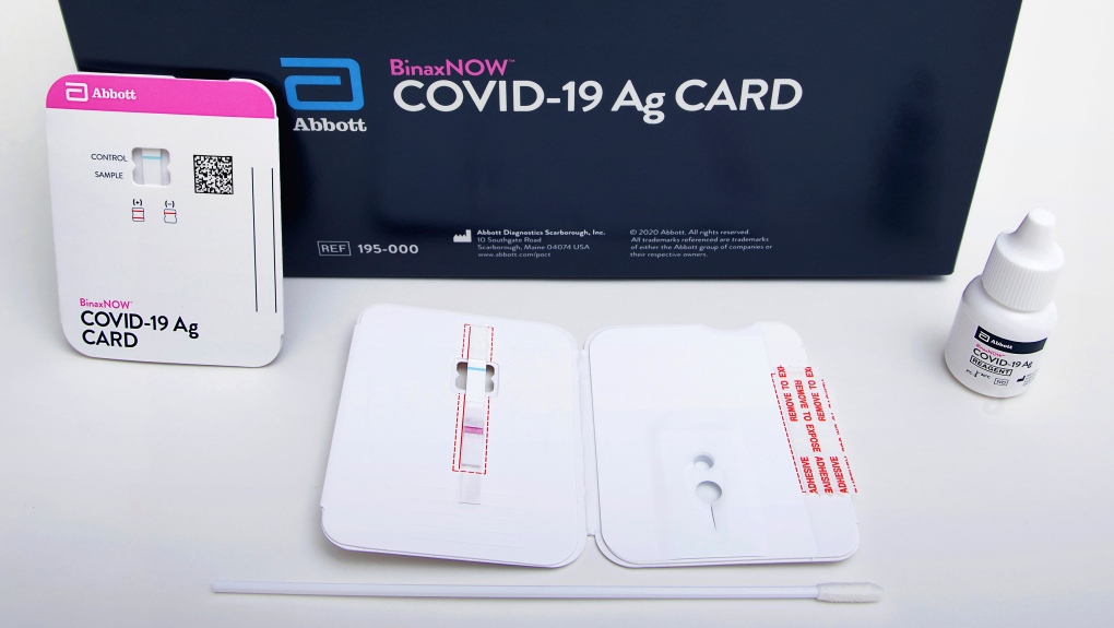 This image provided by Abbott Laboratories in August 2020 shows the company's BinaxNOW rapid COVID-19 nasal swab test. The Food and Drug Administration on Wednesday, Aug. 26, 2020, authorized BinaxNOW, the first rapid coronavirus test that doesn’t need any special computer equipment to get results. (Abbott Laboratories via AP)