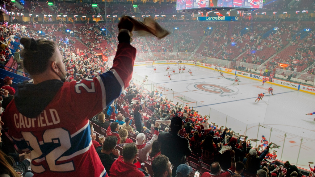 Montreal Canadiens fans cheer during the warm-up skate ahead of the team’s opening home season NHL hockey game against the New York Rangers in Montreal, Saturday, October 16, 2021. THE CANADIAN PRESS/Graham Hughes 