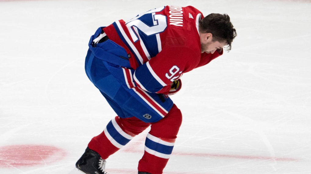 Montreal Canadiens left wing Jonathan Drouin (92) skates to the bench after taking a puck to the head during first period NHL hockey action against the Detroit Red Wings Tuesday, November 2, 2021 in Montreal. THE CANADIAN PRESS/Ryan Remiorz 
