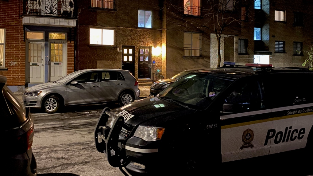 Quebec provincial police conducted searches in Montreal's Saint-Henri neighbourhood on Wednesday, Dec. 1, 2021. (Cosmo Santamaria/CTV News)