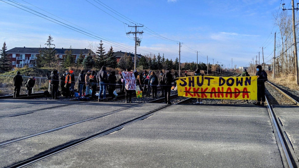 Protestors blocked a stretch of rail in St. Lambert on Montreal's south shore Saturday morning in solidarity with Wet'suwet'en hereditary chiefs in B.C. (Image courtesy of @Anticolonialmtl)