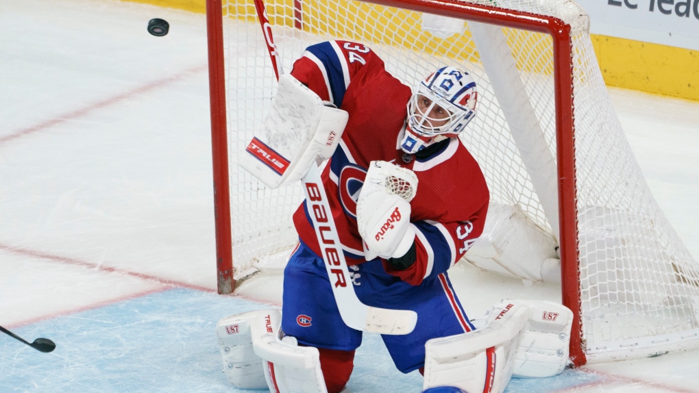 Montreal Canadiens goaltender Jake Allen makes a save against the Winnipeg Jets during third period NHL hockey action in Montreal on Friday, April 30, 2021. THE CANADIAN PRESS/Paul Chiasson