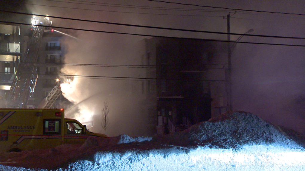 A condominium building in Blainville was engulfed in flames. (Cosmo Santamaria/CTV News)