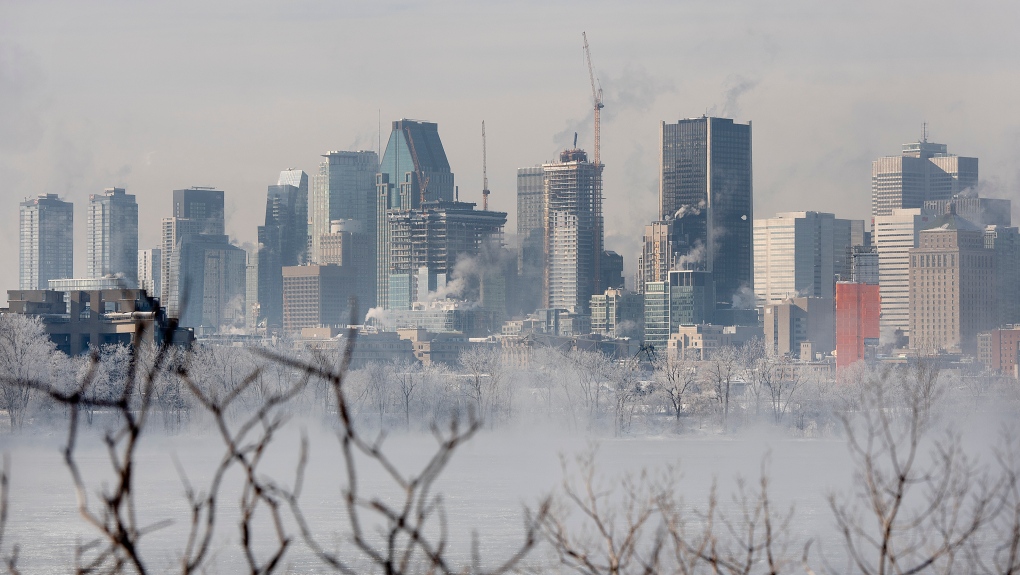 Ice fog rises off the St. Lawerence River in Montreal, Saturday, Jan. 22, 2022. Environment Canada has issued an extreme cold warning for the region. THE CANADIAN PRESS/Graham Hughes