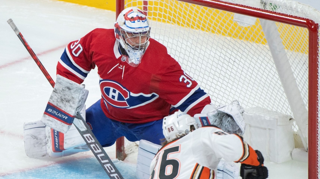 Anaheim Ducks’ Simon Benoit takes a shot on Montreal Canadiens goaltender Cayden Primeau during first period NHL hockey action in Montreal, Thursday, January 27, 2022. THE CANADIAN PRESS/Graham Hughes 
