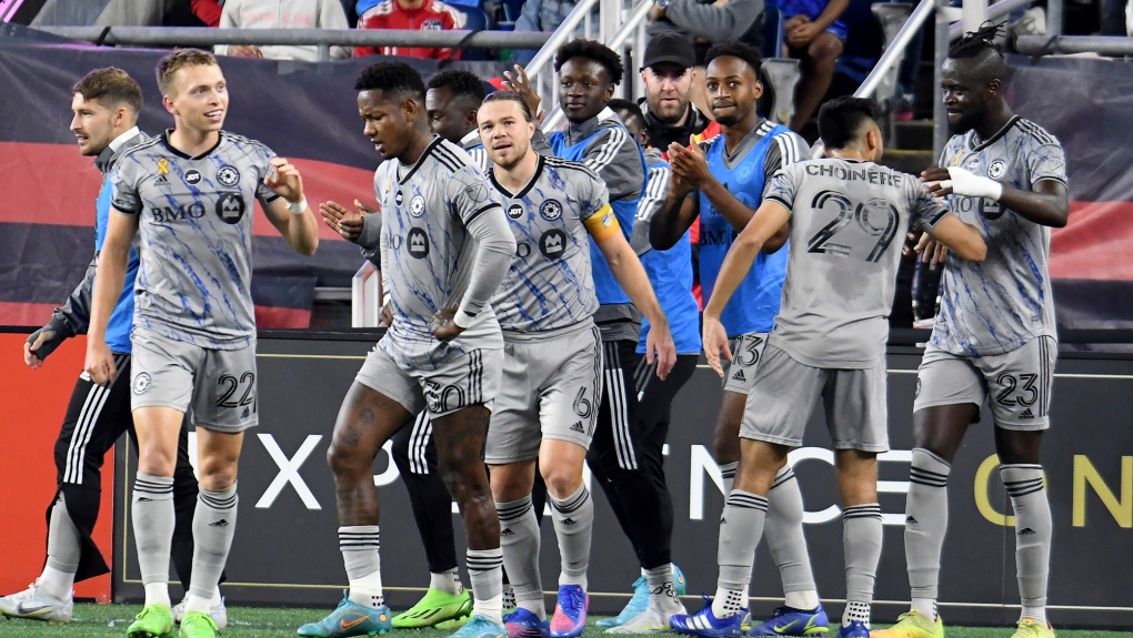 CF Montreal celebrate their second-half goal made by Alistair Johnston (22) over the New England Revolution during an MLS soccer match Saturday, Sept. 17, 2022, in Foxborough, Mass. (AP Photo/Mark Stockwell)