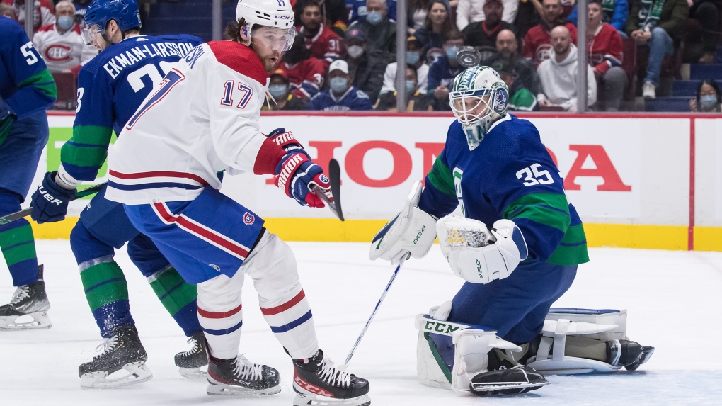Vancouver Canucks goalie Thatcher Demko (35) stops Montreal Canadiens' Josh Anderson (17) during the first period of an NHL hockey game in Vancouver, on Wednesday, March 9, 2022. THE CANADIAN PRESS/Darryl Dyck