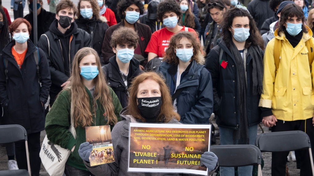 People take part in a climate change protest in Montreal, Friday, March 25, 2022. THE CANADIAN PRESS/Ryan Remiorz