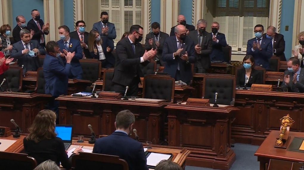 CAQ MNAs stand up and applaud as they vote against a public inquiry into Herron long-term care home.
