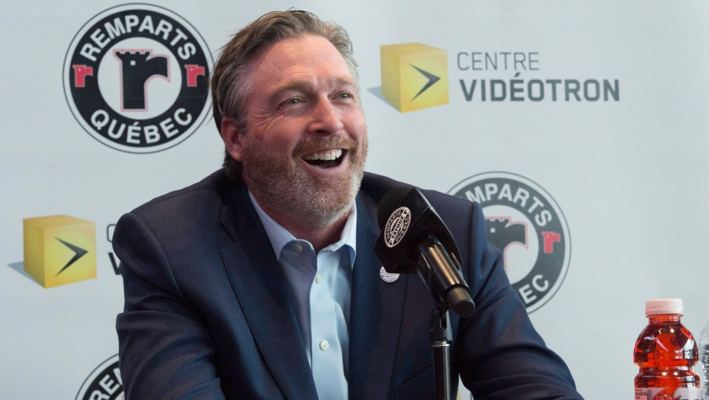 Hall of Fame goaltender Patrick Roy smiles as he announces his comeback with the Quebec Remparts of the QJMHL, Thursday, April 26, 2018 at the Videotron centre in Quebec City. Roy will be general manager and coach for the Remparts. THE CANADIAN PRESS/Jacques Boissinot
