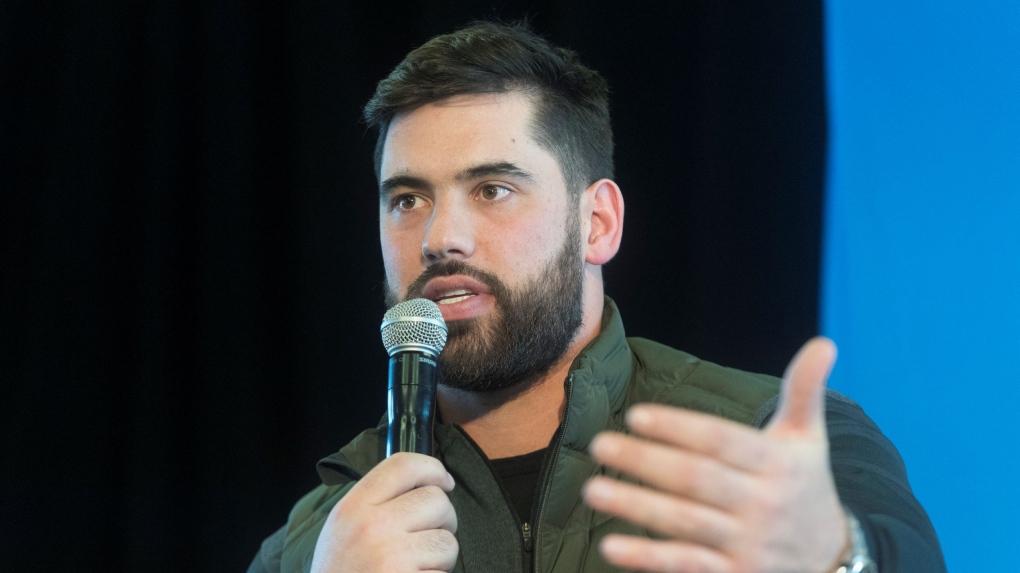 Super Bowl champion and Kansas City Chiefs player Laurent Duvernay-Tardif speaks during a news conference prior to an event to celebrate his win in Montreal, Sunday, February 9, 2020. THE CANADIAN PRESS/Graham Hughes