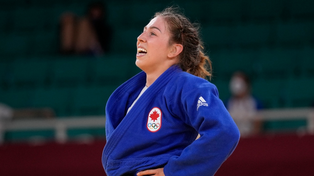 Catherine Beauchemin-Pinard of Canada reacts after winning the women -63kg bronze medal match against Anriquelis Barrios of Venezuela, unseen, in the judo match at the 2020 Summer Olympics in Tokyo, Japan, Tuesday, July 27, 2021. (AP Photo/Vincent Thian)