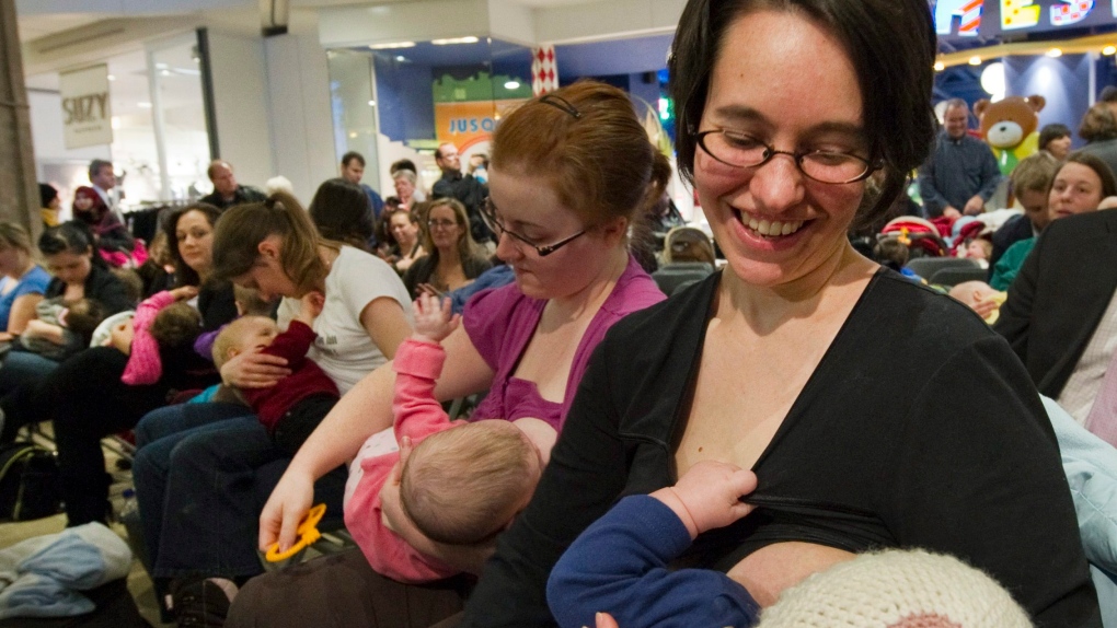 Women breastfeed their babies at a protest for nursing in public in Montreal, on January 19, 2011. -- FILE PHOTO (THE CANADIAN PRESS/Ryan Remiorz)