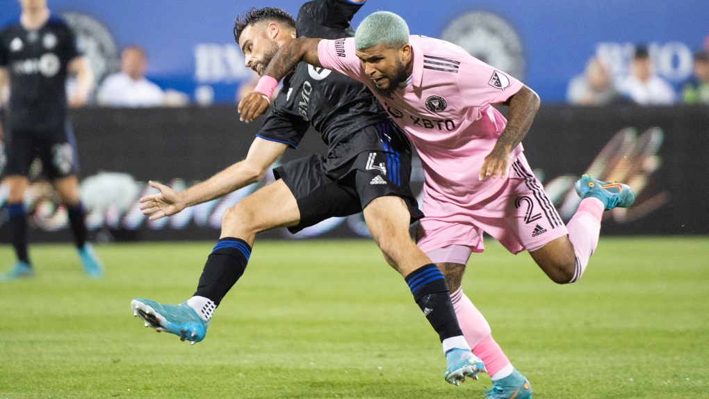 Rudy Camacho of CF Montreal, left, challenges DeAndre Yedlin of Inter Miami during second half MLS soccer action in Montreal, Saturday, August 6, 2022. THE CANADIAN PRESS/Graham Hughes