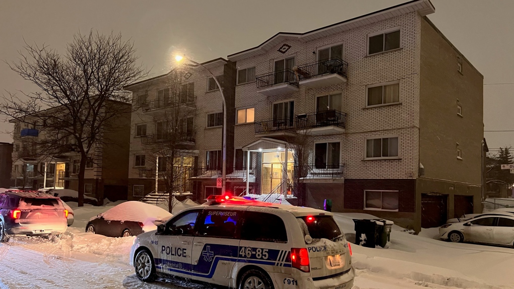A police vehicle sits near the scene where two men were found with upper-body injuries early Thursday morning. One of them was arrested. (Cosmo Santamaria, CTV News)