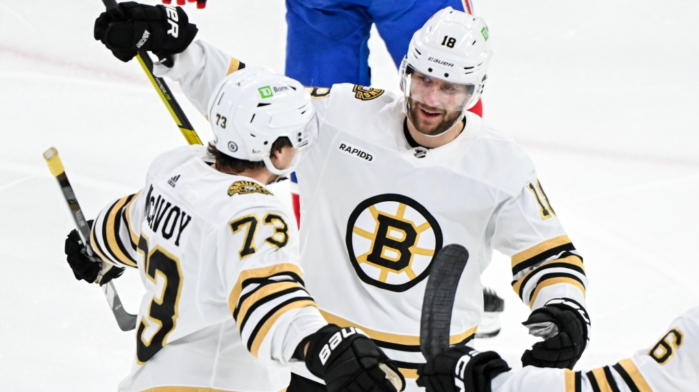 Boston Bruins' Pavel Zacha (18) celebrates with teammate Charlie McAvoy (73) after scoring against the Montreal Canadiens during first period NHL hockey action in Montreal, Saturday, November 11, 2023. FILE PHOTO  - THE CANADIAN PRESS/Graham Hughes