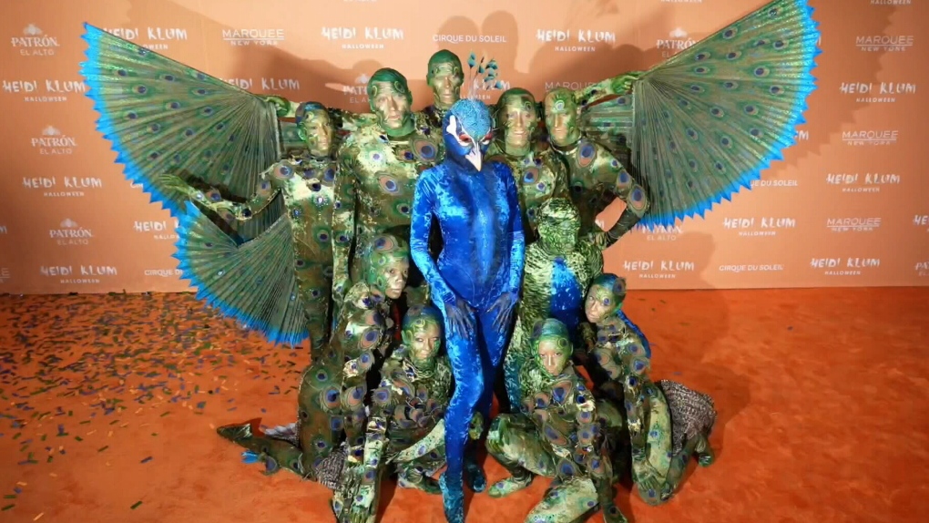 Cirque du Soleil brought Heidi Klum's peacock costume to life