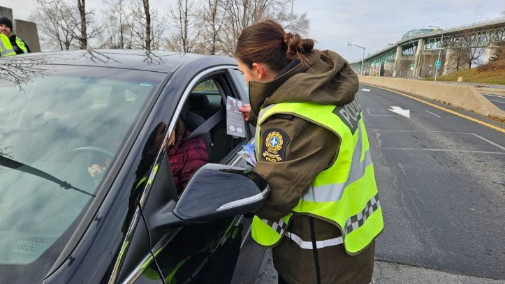 A Surete du Quebec officer operates an impaired driving check. SOURCE: SQ
