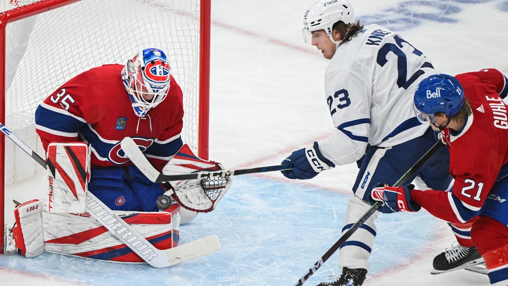 Toronto Maple Leafs' Matthew Knies (23) is stopped by Montreal Canadiens goaltender Samuel Montembeault during second period NHL preseason hockey action in Montreal, Saturday, Sept. 30, 2023. THE CANADIAN PRESS/Graham Hughes