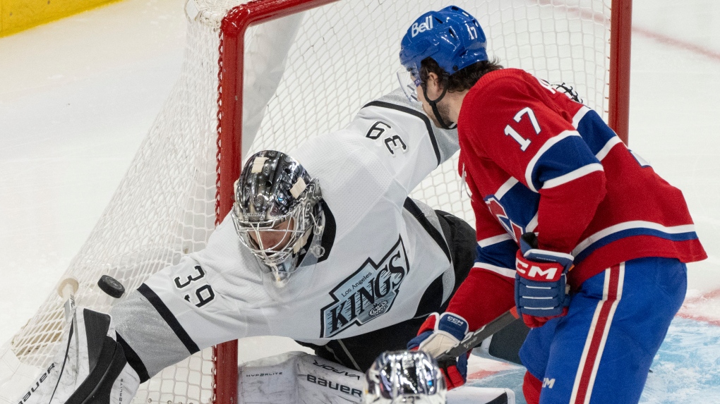 Los Angeles Kings goaltender Cam Talbot (39) makes a save against Montreal Canadiens' Josh Anderson (17) during third period NHL hockey action in Montreal on Thursday, Dec. 7, 2023. (THE CANADIAN PRESS/Christinne Muschi)