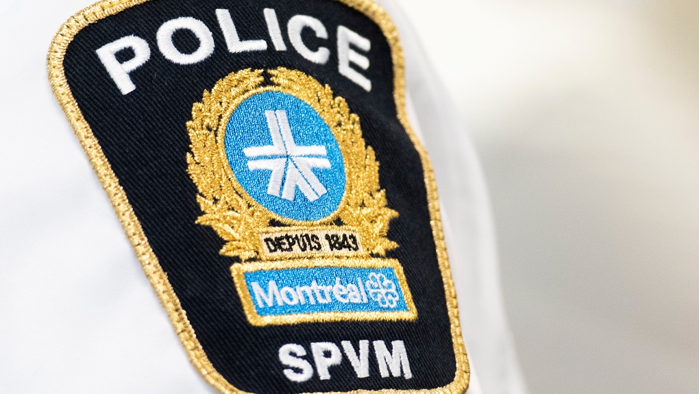 A Montreal police badge is shown during a news conference by Public Safety Minister Marco Mendicino in Montreal, Thursday, August 4, 2022, where he announced federal support for organizations on the front lines of the fight against gun and gang violence in Quebec. THE CANADIAN PRESS/Graham Hughes