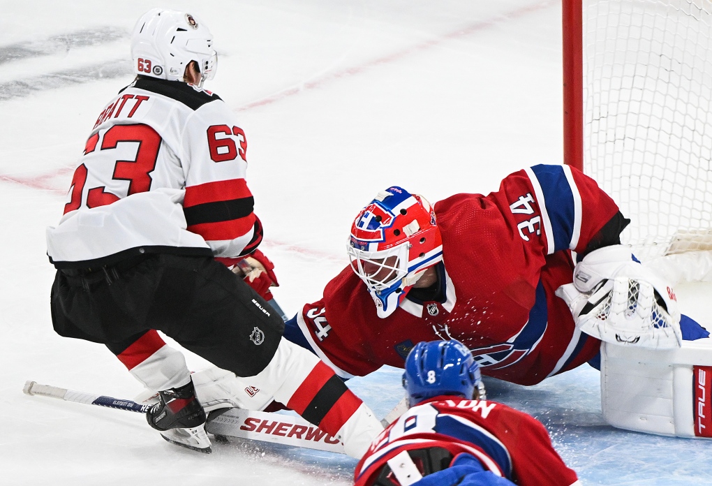 Montreal Canadiens goaltender Jake Allen stops New Jersey Devils' Jesper Bratt during third period NHL hockey action in Montreal, Saturday, March 11, 2023. THE CANADIAN PRESS/Graham Hughes