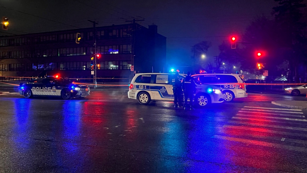 Montreal police officers investigate a report of gunshots fired from two moving vehicles in Ahuntsic-Cartierville on Thursday, March 23, 2023. (Cosmo Santamaria/CTV News)