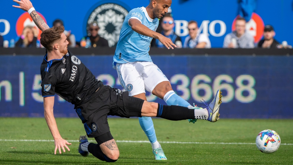 New York City forward Héber (9) right, is challenged by CF Montréal defender Joel Waterman (16) during second half MLS Eastern Conference semifinals soccer action in Montreal, Sunday, October 23, 2022. THE CANADIAN PRESS/Graham Hughes