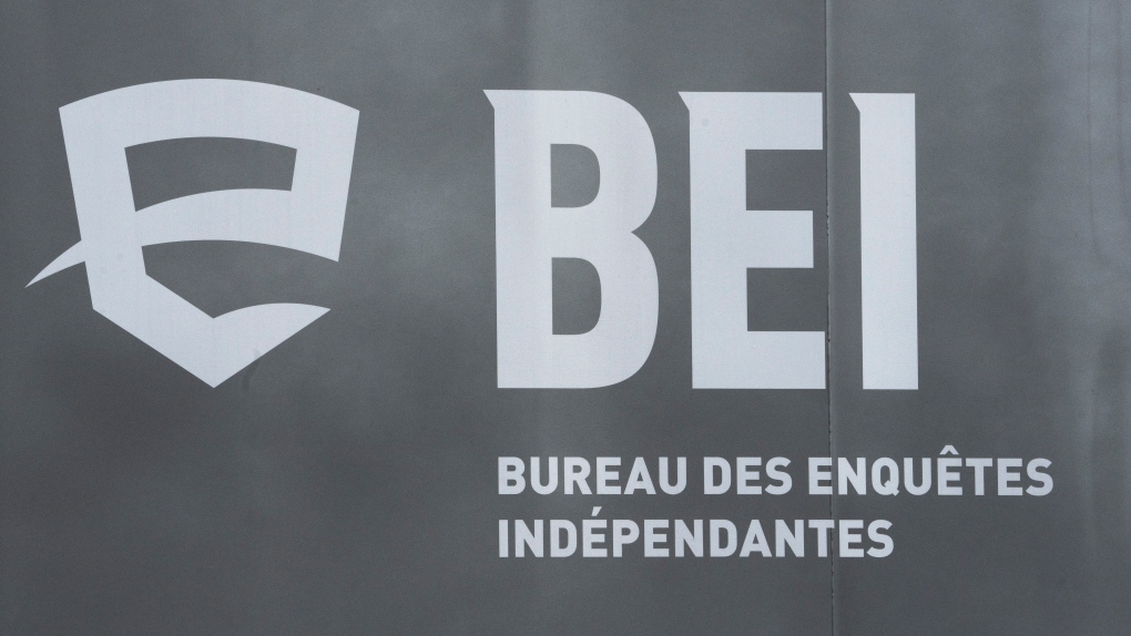 The BEI logo, Quebec’s independent police bureau, is seen as investigators examine the scene in Louiseville, Que., Tuesday, March 28, 2023. THE CANADIAN PRESS/Ryan Remiorz