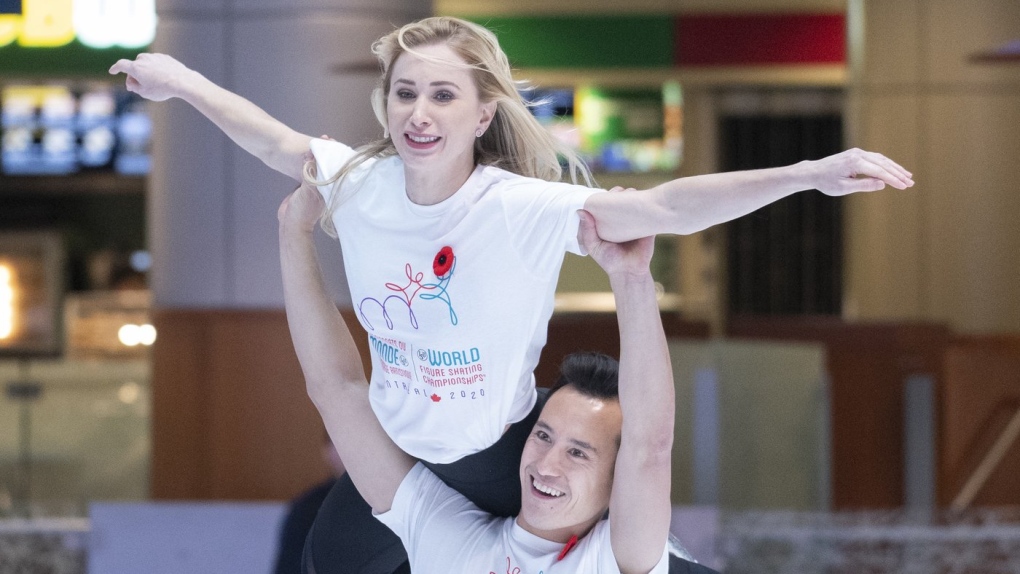 Canadian figure skater Patrick Chan lifts compatriot Joannie Rochette at an event in Montreal on November 4, 2019. THE CANADIAN PRESS/Paul Chiasson