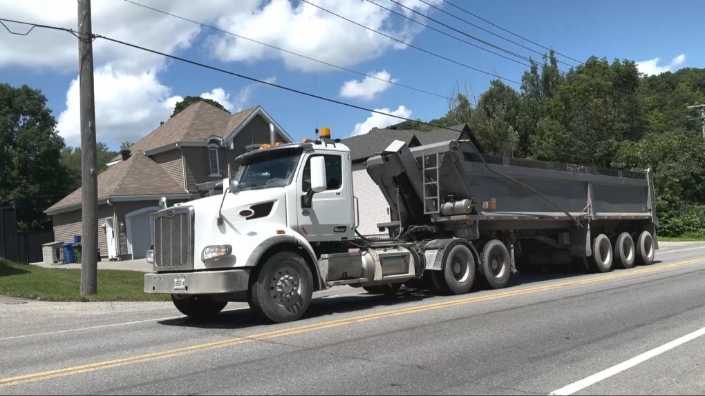 Trucks are dumping construction material in the community of Kanesatake and residents are getting fed up.