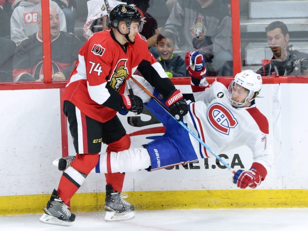 Ottawa Senators forward Borowieck hits GIlbert