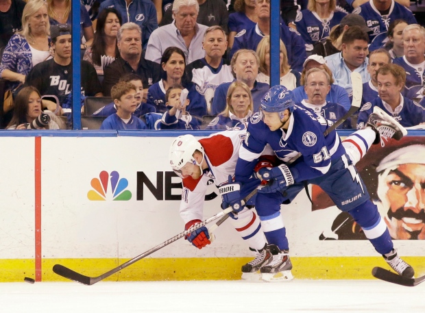 Filppula and Eller battle for the puck