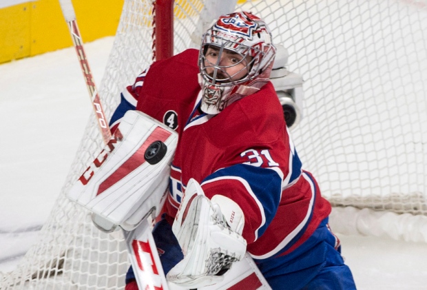 Montreal Canadiens goalie Carey Price deflects a T