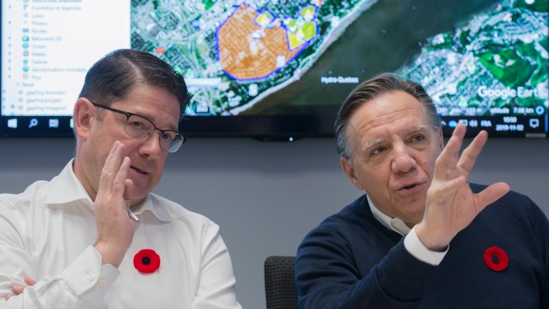 Hydro-Quebec CEO Eric Martel and Francois Legault