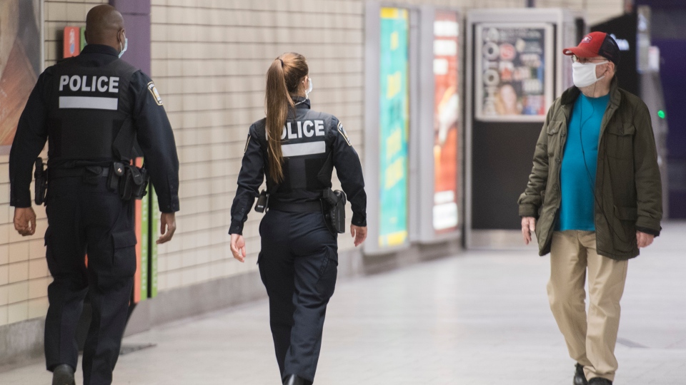 Police in a Montreal metro