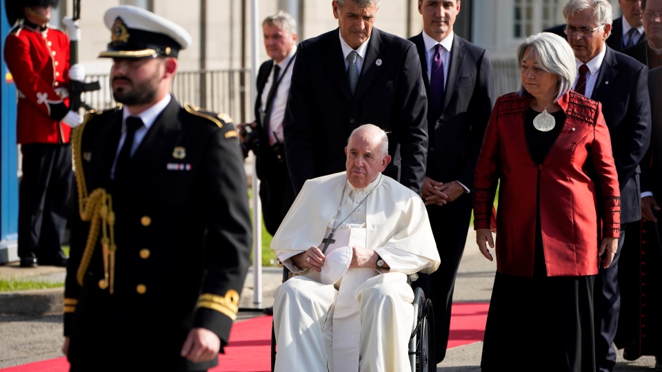Pope Francis accompanied by Governor-General Mary